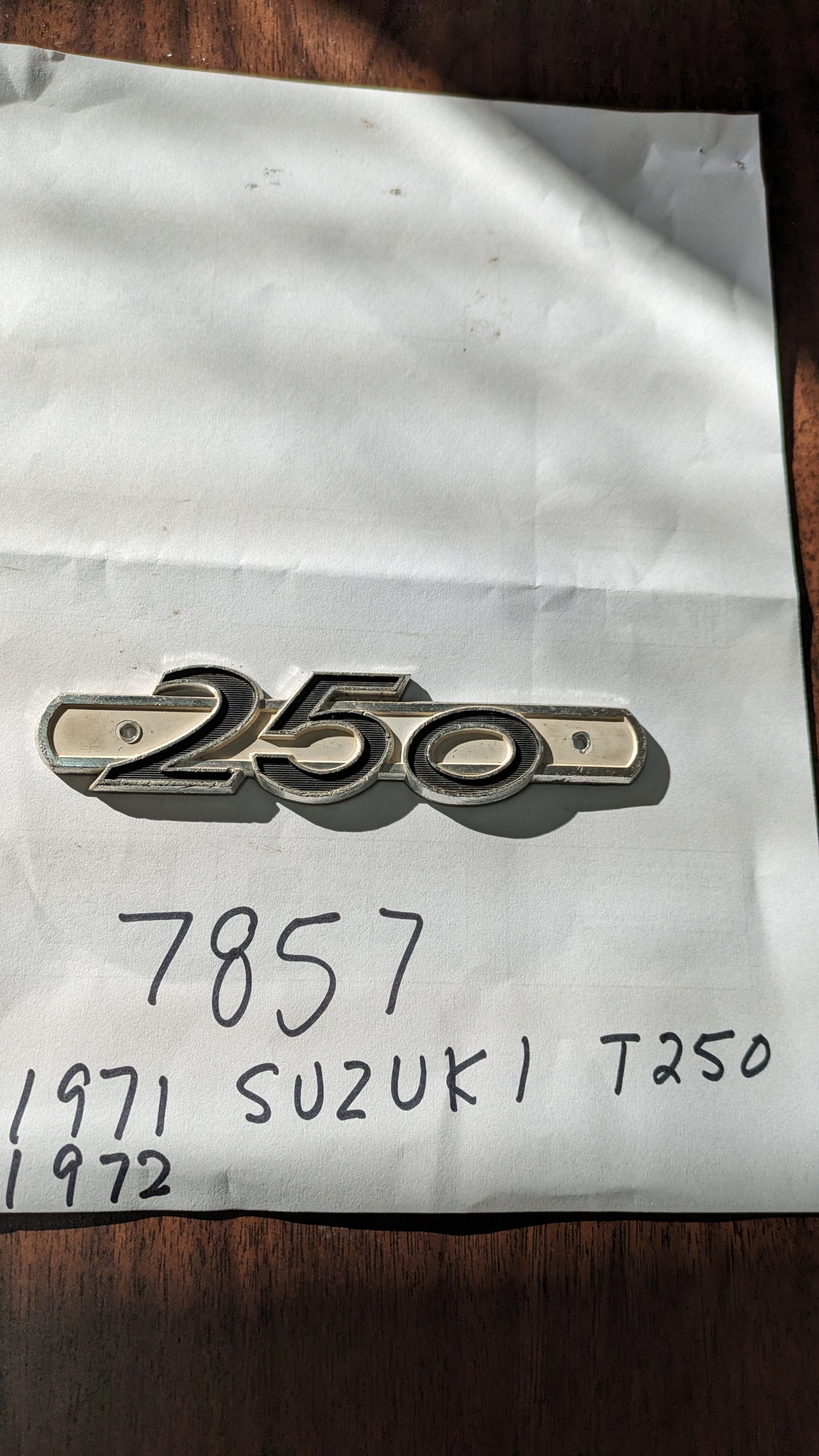 Suzuki T250 1970-1971 OEM Metal Sidecover Badge  sku 7857