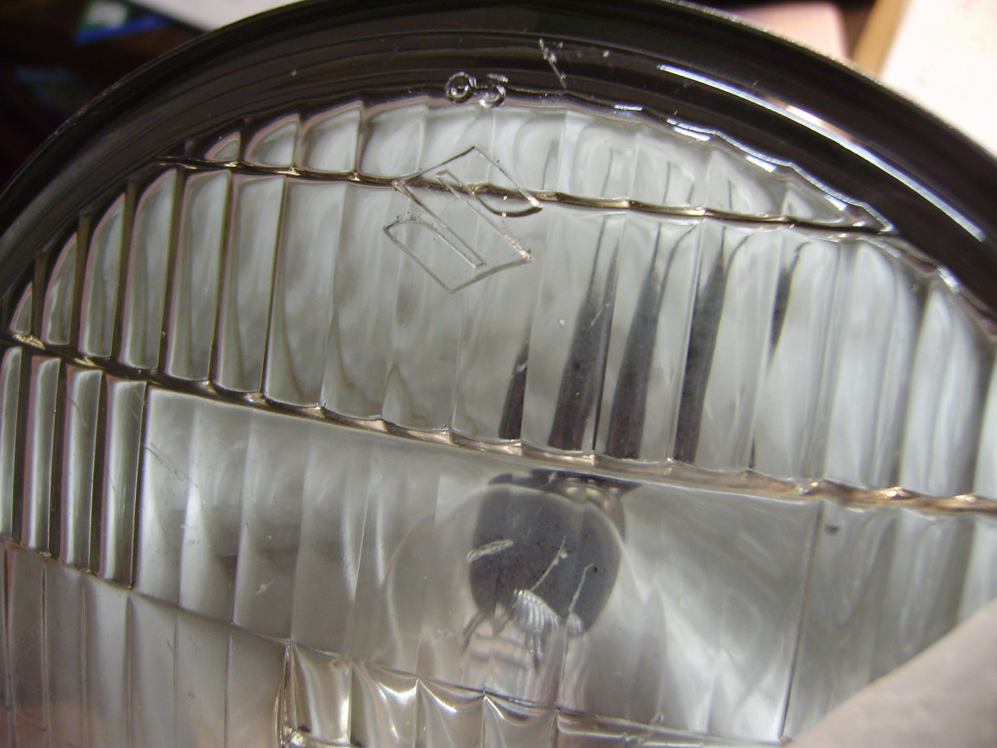 Suzuki TS 400 OEM 12V Headlight Bulb Also Fits 1960's/1970's  Suzuki 12V Horizontal edge headlights   my sku 7787