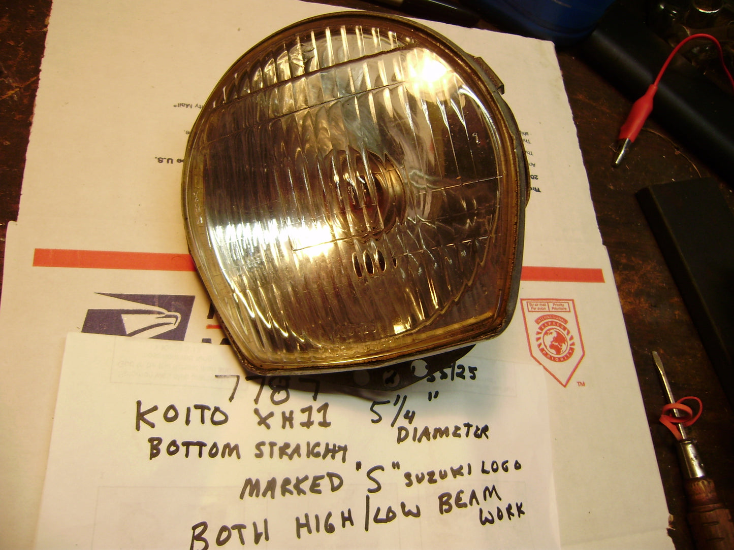 Suzuki TS 400 OEM 12V Headlight Bulb Also Fits 1960's/1970's  Suzuki 12V Horizontal edge headlights   my sku 7787