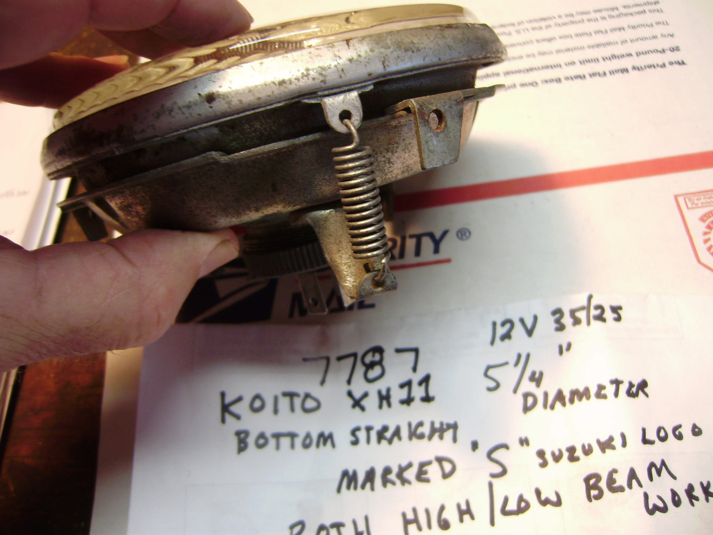 Suzuki TS 400 OEM 12V Headlight Bulb Also Fits 1960's/1970's  Suzuki 12V Horizontal edge headlights   my sku 7787