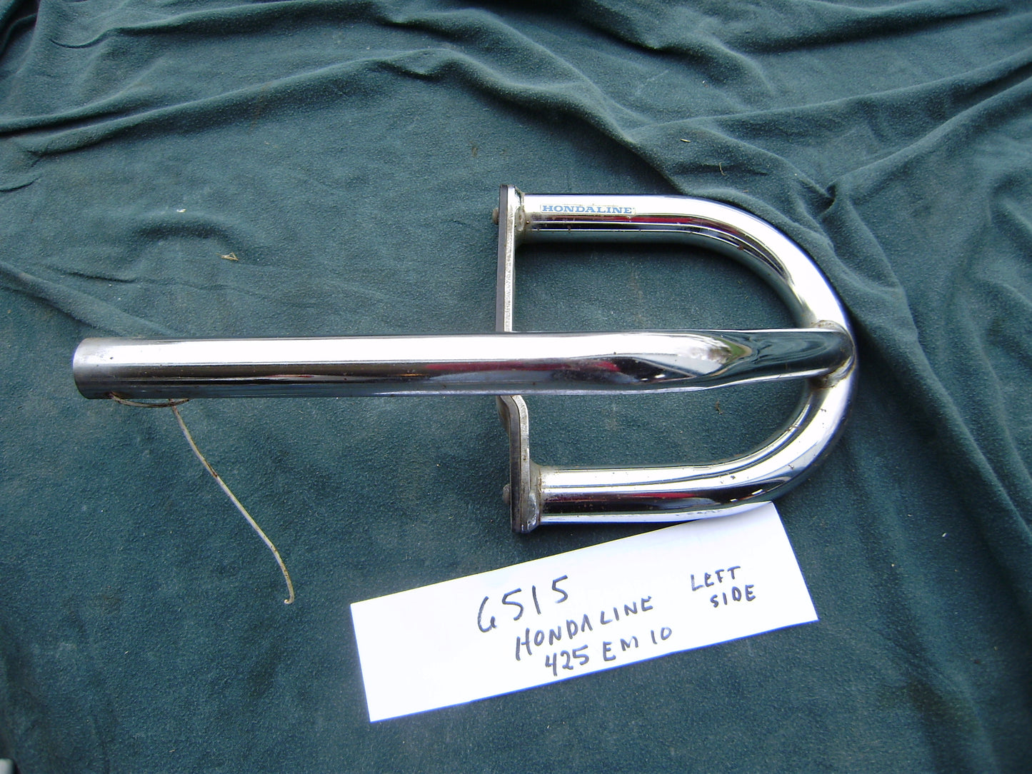 Hondaline Left engine guard marked 425 EM10 sku 6515