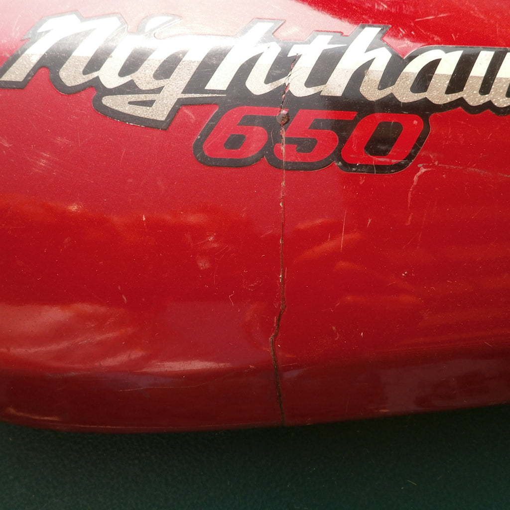 Honda CB650SC Nighthawk sidecover red left 83710-ME5-0200