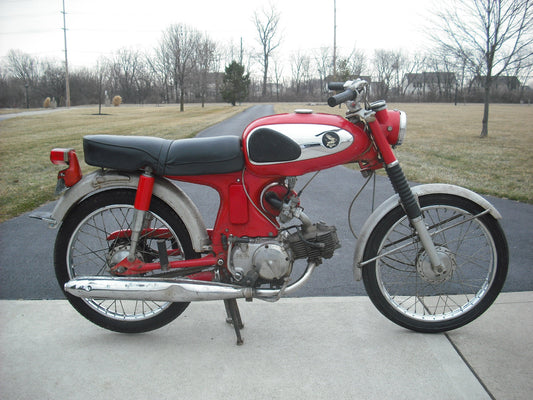 Honda Super 90's lined up on the Driveway