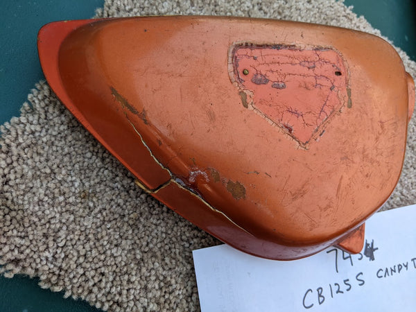 Honda CB125 OEM right sidecover with damage sku 7454