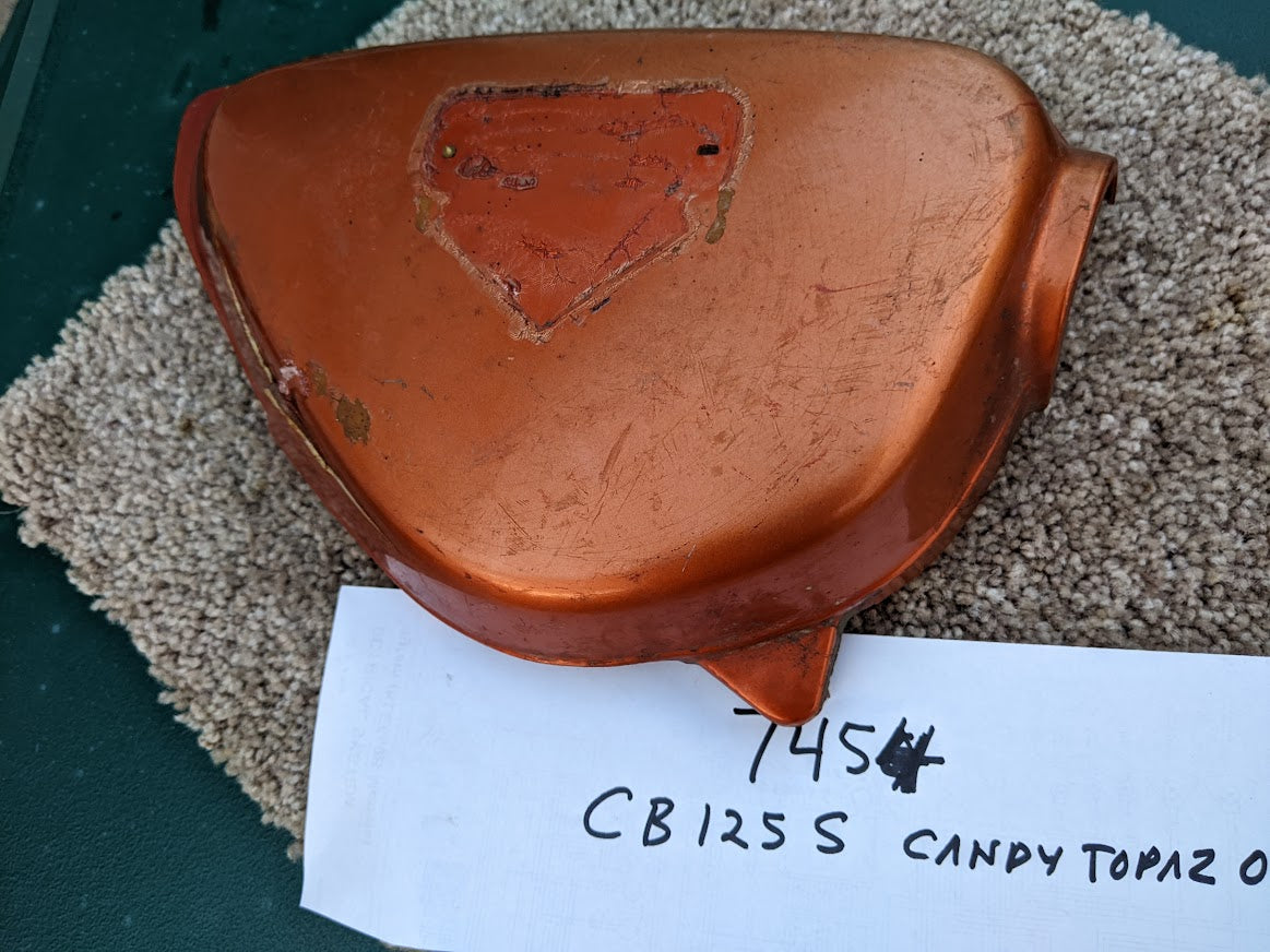 Honda CB125 OEM right sidecover with damage sku 7454