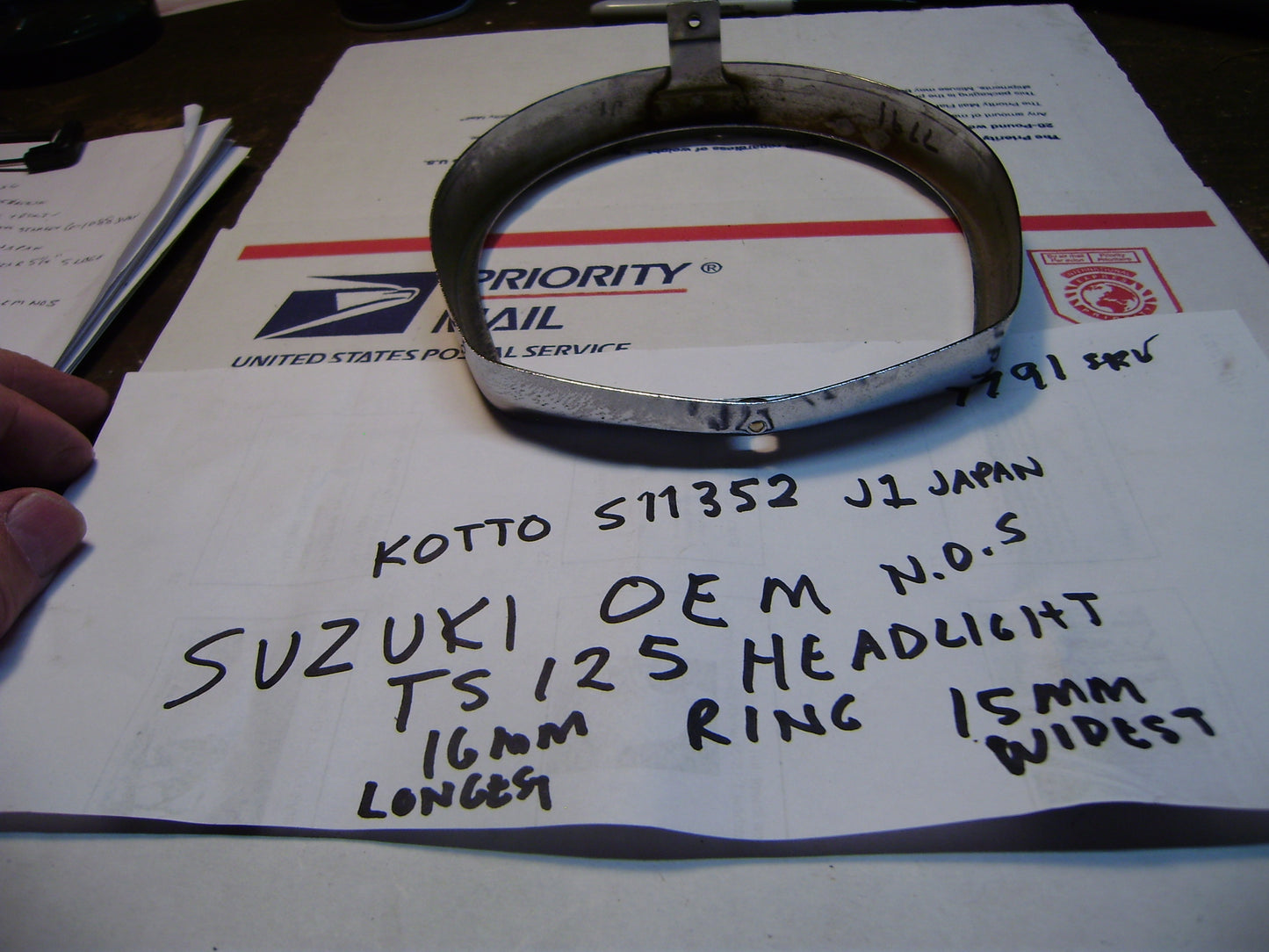 Suzuki TS TC NOS OEM Headlight Ring  sku 7791