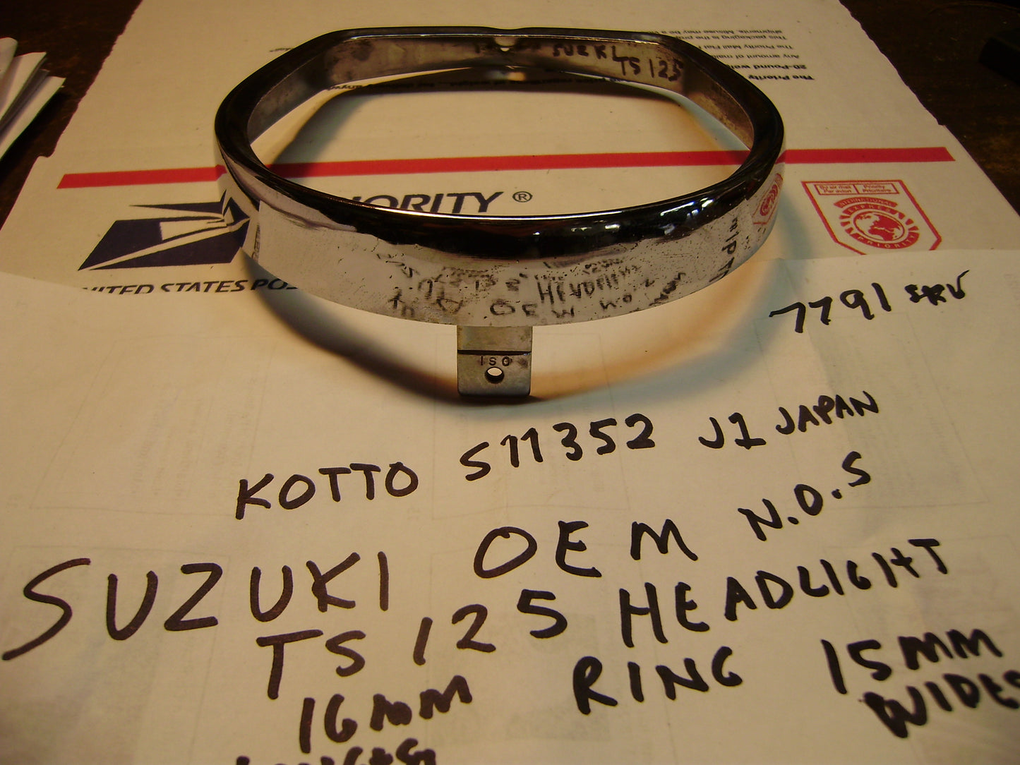 Suzuki TS TC NOS OEM Headlight Ring  sku 7791