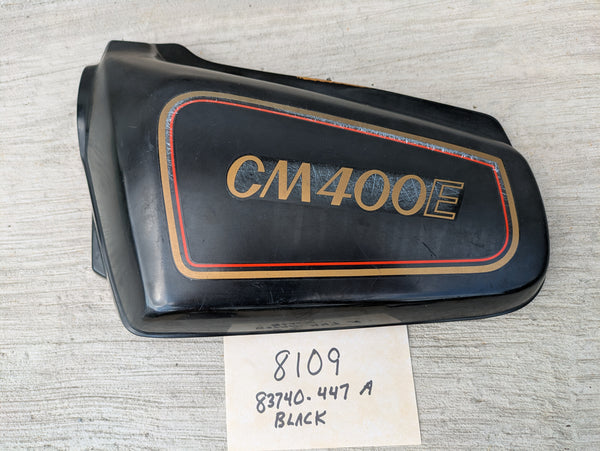 Honda CM400E black  Left Side Cover  83740-447A Missing a mounting pin sku 8109