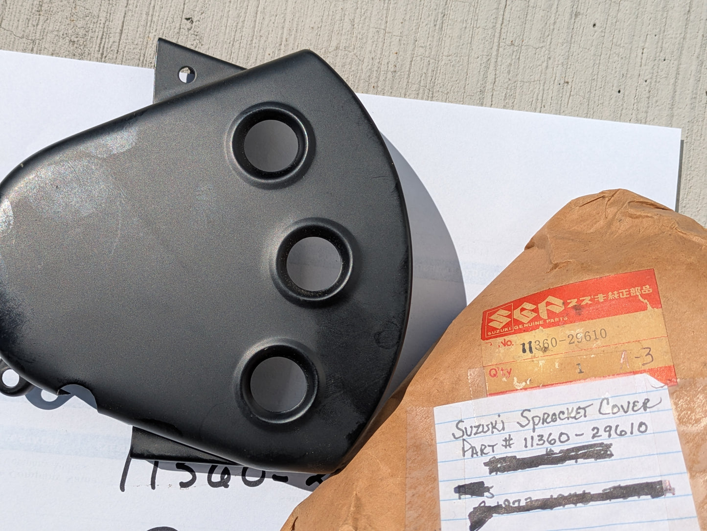 Suzuki TS185 1973-1976  Sprocket Cover NOS  11360-29610 sku 8119