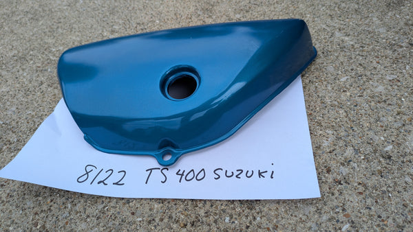 Suzuki TS400B NOS 1977 blue 47211-28601-279 sidecover my sku 8122