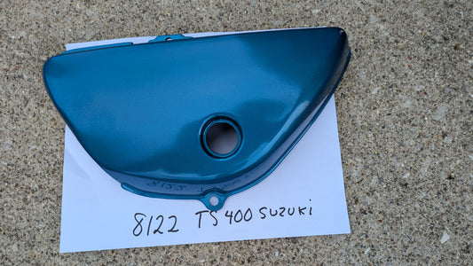 Suzuki TS400B NOS 1977 blue 47211-28601-279 sidecover my sku 8122