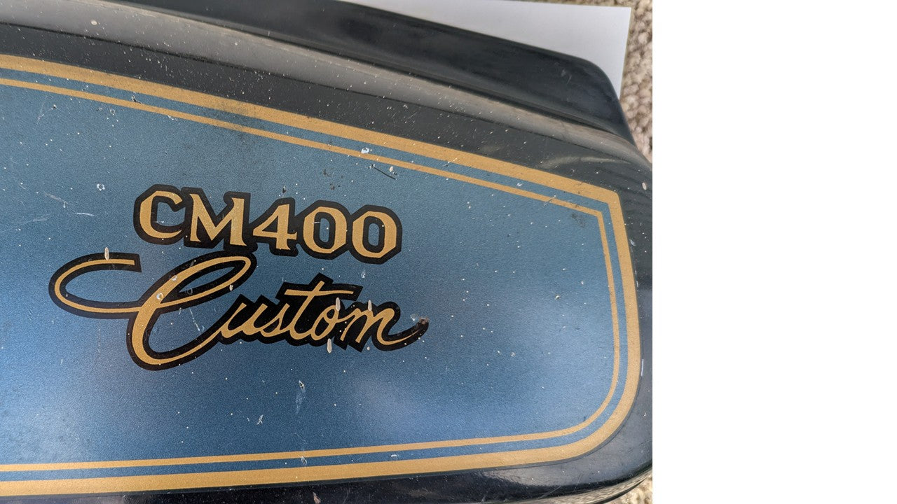Honda CM400C 81 Custom   cosmo blackmetallic/meticallic blue left sidecover  sku 8308