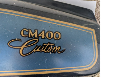Honda CM400C 81 Custom   cosmo blackmetallic/meticallic blue left sidecover  sku 8308