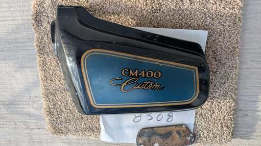 Honda CM400C 81 Custom   cosmo blackmetallic/meticallic blue left sidecover  sku 8308