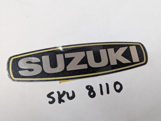Suzuki OEM  Magneto badge sku 8110