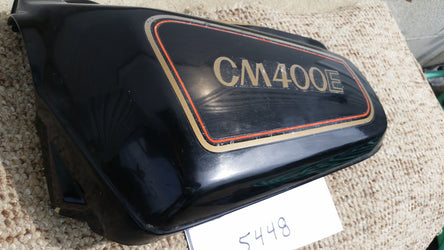 Sold Ebay 5/20/20Honda CM400E Sidecover Left Black Honda part 83740-447A sku 3448