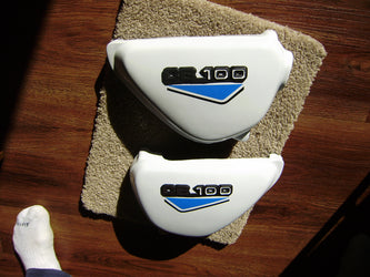 Honda CB100 New White sidecover Pair blue decals sku 6156