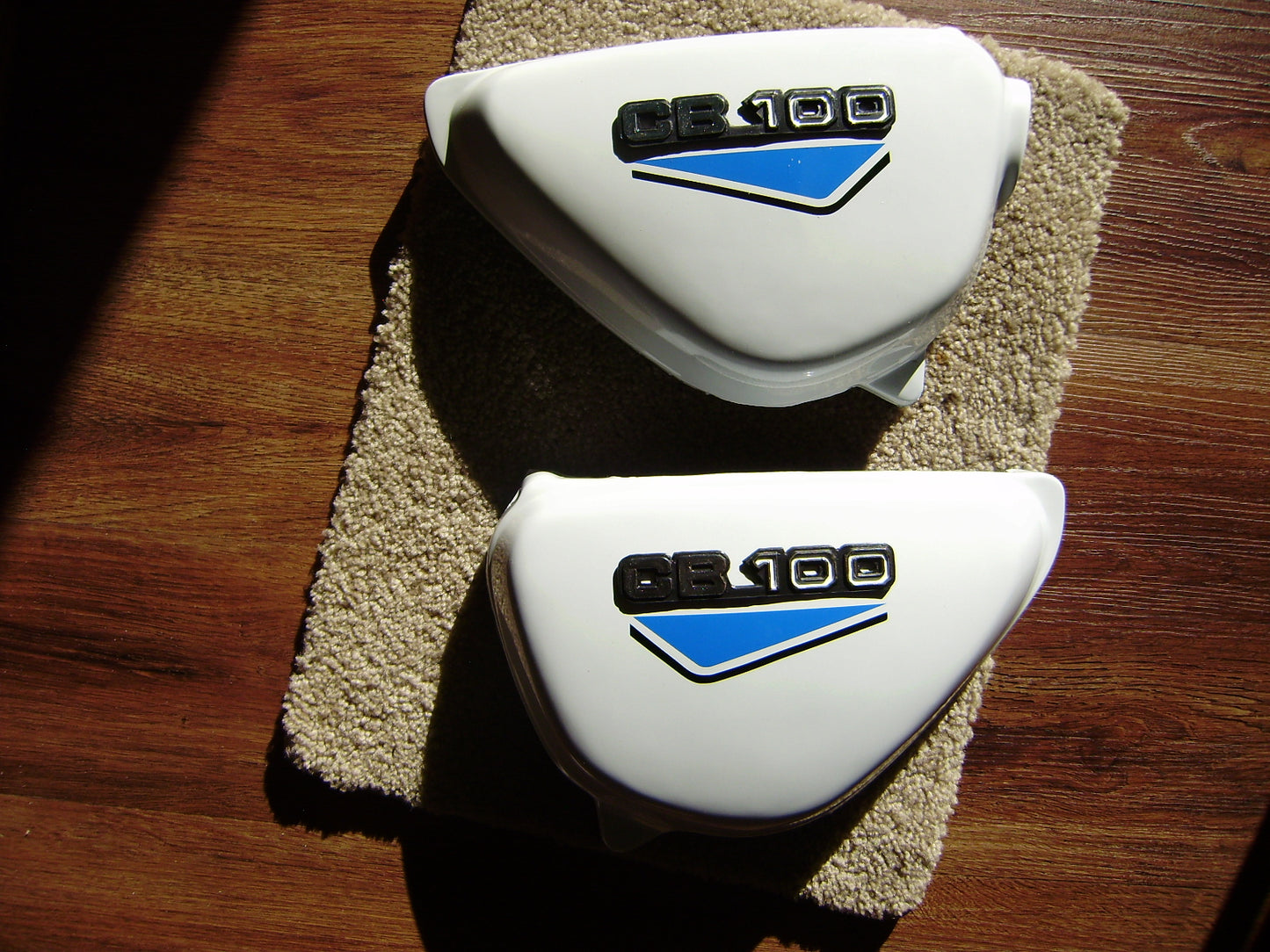 Honda CB100 New White sidecover Pair blue decals sku 6156