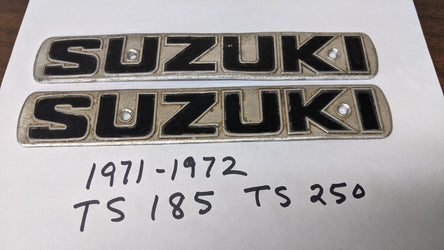 Sold ebay 8/7/21 Suzuki TS185 TS250 1971 1972 metal gas tank badge pair sku 6655