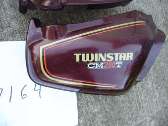 Sold Ebay Honda Twinstar CM200T OEM Maroon Sidecover Pair sku 7164