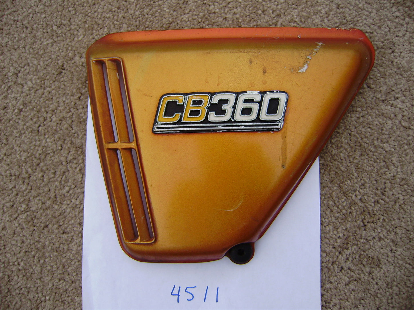 Honda CB360 orange left sidecover sku 4511