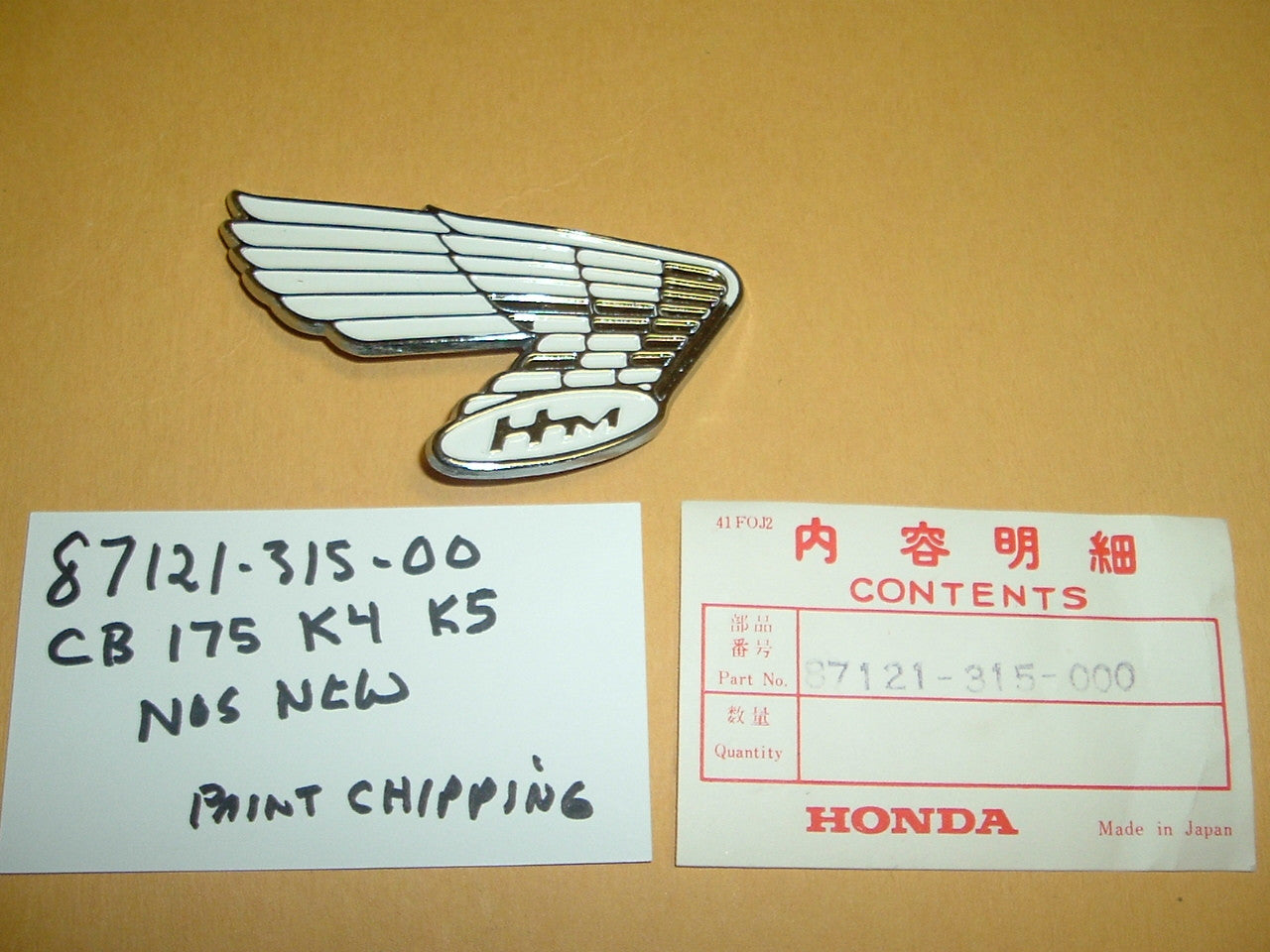 Honda CB175 gas tank wing New old stock 87121-315-000   sku 1122