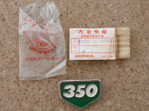 Honda CB350K0K2  NOS Green Sidecover Badge 87128-287-010BA Sold 8/21/18