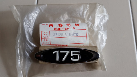 Honda CL175 NOS black sidecover badge  871215-315-670 sku 4257