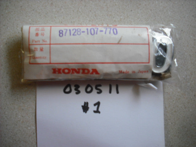 Honda CB100K1 NOS Sidecover Badge 87128-107-770    sku 1985