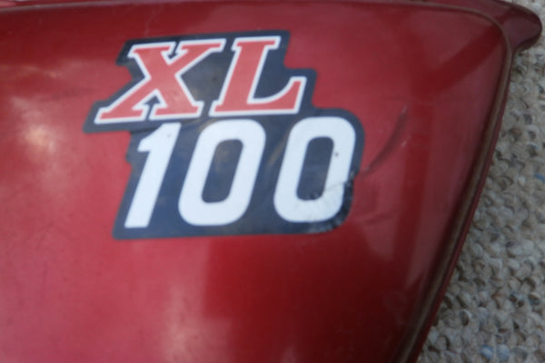 Sold by Invoice 82.50    11/17/16 Honda XL100 Candy Ruby left  sidecover 4365